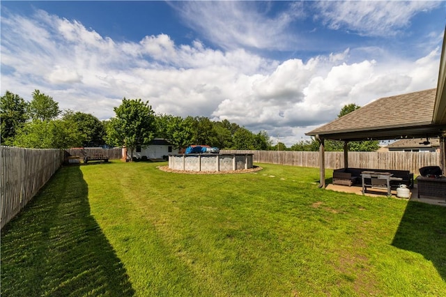view of yard with a patio area