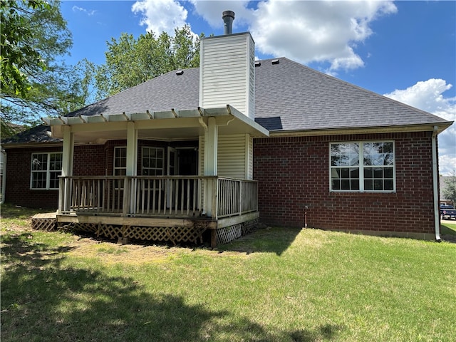 5095 Saxon St, Springdale, AR 72764 - back of house with brick siding, a shingled roof, and a lawn