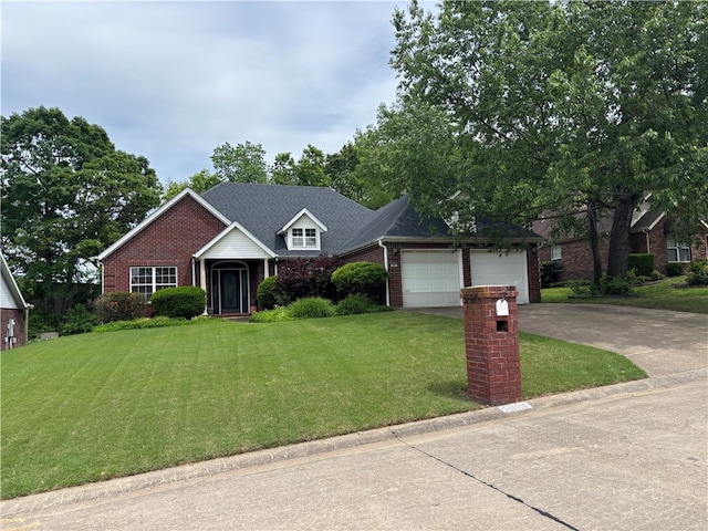 5095 Saxon St, Springdale, AR 72764 - view of front of property with brick siding, a front lawn, and a garage