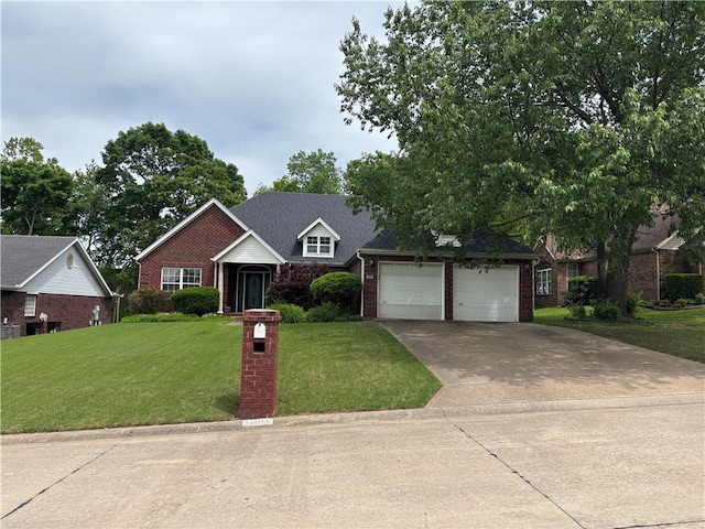 5095 Saxon St, Springdale, AR 72764 - view of front of house featuring brick siding, a front lawn, driveway, and a garage