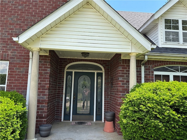 5095 Saxon St, Springdale, AR 72764 - property entrance with brick siding and a shingled roof