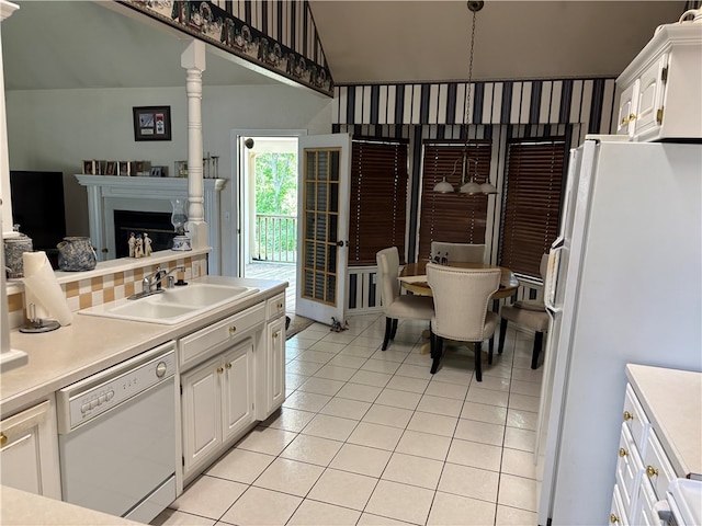 5095 Saxon St, Springdale, AR 72764 - kitchen featuring white appliances, a sink, white cabinetry, light countertops, and light tile patterned floors