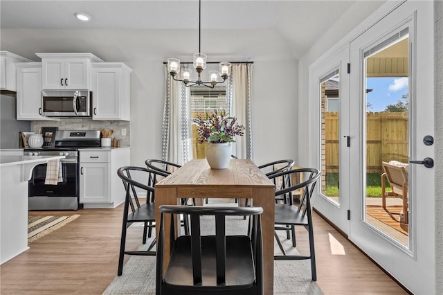 449 Hall St, West Fork, AR 72774 - dining space with a chandelier, light wood-style flooring, recessed lighting, and vaulted ceiling