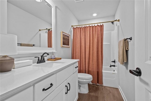 449 Hall St, West Fork, AR 72774 - full bathroom with wood finished floors, toilet, vanity, and shower / bath combination with curtain