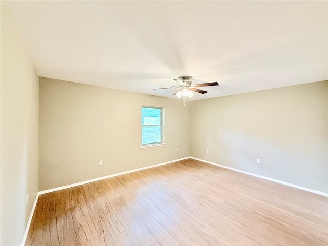 10098 Bayview Rd, Dardanelle, AR 72834 - unfurnished room with light wood-style flooring, baseboards, and ceiling fan