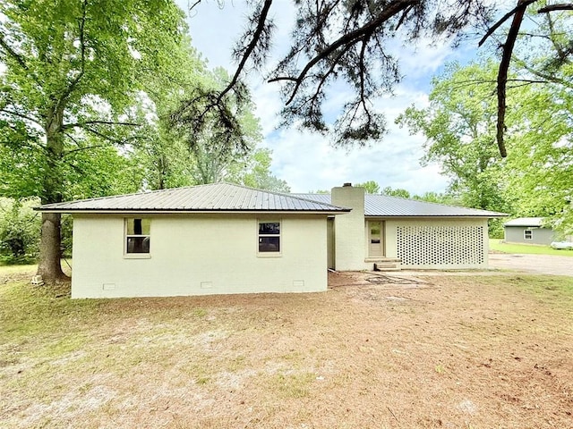 10098 Bayview Rd, Dardanelle, AR 72834 - back of property featuring entry steps and metal roof
