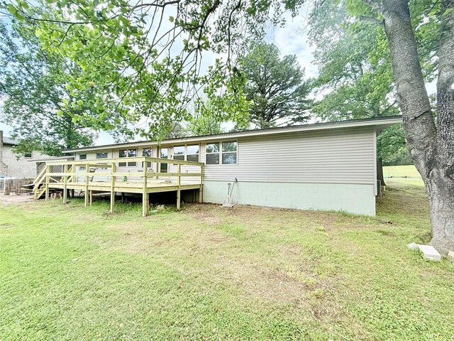 10098 Bayview Rd, Dardanelle, AR 72834 - rear view of house featuring a yard and a wooden deck