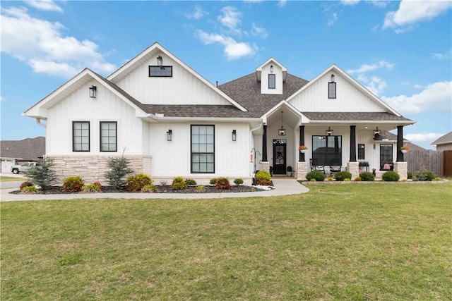 1904 Tull Dr, Pea Ridge, AR 72751 - modern farmhouse style home featuring roof with shingles, a front lawn, a porch, and board and batten siding
