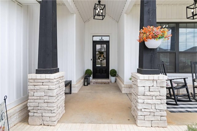 1904 Tull Dr, Pea Ridge, AR 72751 - entrance to property featuring covered porch and board and batten siding