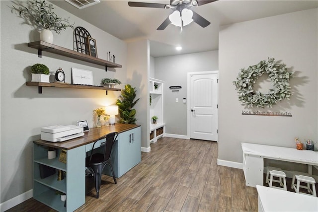 1904 Tull Dr, Pea Ridge, AR 72751 - home office featuring a ceiling fan, wood finished floors, and baseboards