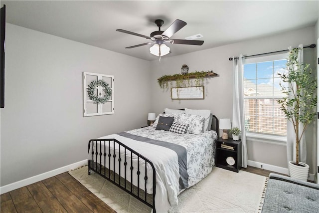 1904 Tull Dr, Pea Ridge, AR 72751 - bedroom featuring baseboards, wood finished floors, and ceiling fan