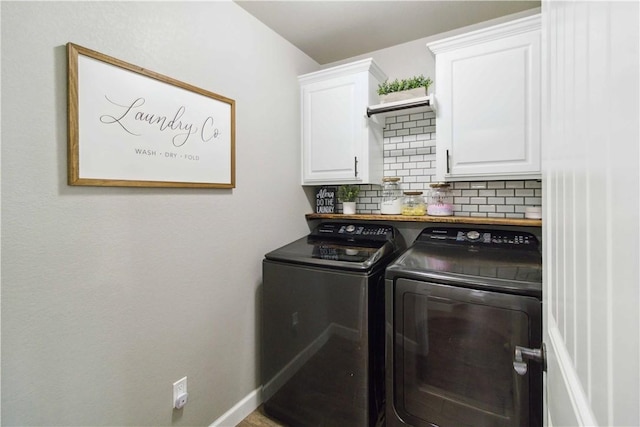1904 Tull Dr, Pea Ridge, AR 72751 - washroom with cabinet space, washer and dryer, and baseboards