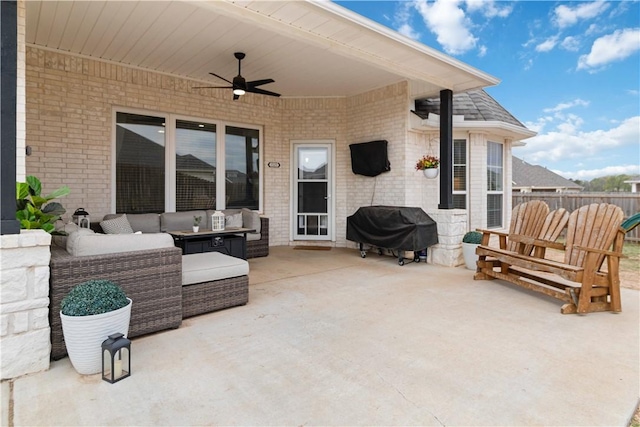 1904 Tull Dr, Pea Ridge, AR 72751 - view of patio featuring grilling area, ceiling fan, outdoor lounge area, and fence