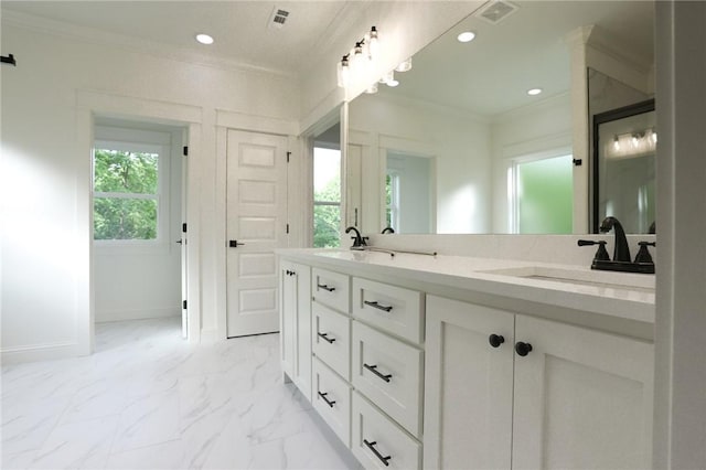 3 Berkshire Dr, Bella Vista, AR 72714 - bathroom featuring crown molding, marble look tiles, double vanity, recessed lighting, and baseboards