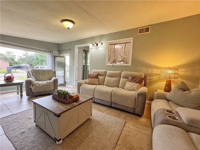 1008 E H St, Russellville, AR 72801 - living room featuring light tile patterned floors