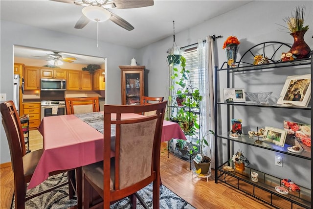 3277 Bellefonte Rd, Harrison, AR 72601 - dining room featuring ceiling fan and light wood finished floors