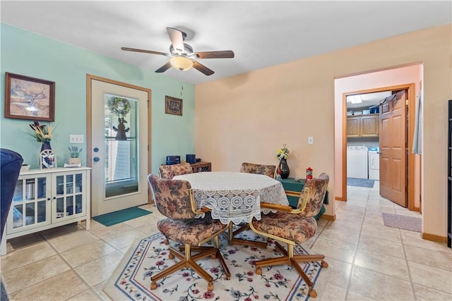 3277 Bellefonte Rd, Harrison, AR 72601 - dining area with washing machine and clothes dryer, ceiling fan, and light tile patterned floors