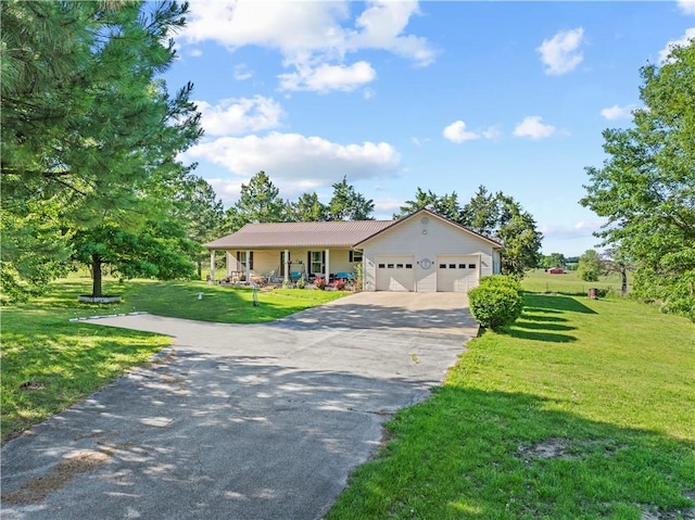 3277 Bellefonte Rd, Harrison, AR 72601 - ranch-style home featuring a front yard, driveway, an attached garage, and a porch