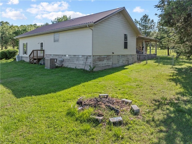 3277 Bellefonte Rd, Harrison, AR 72601 - view of property exterior featuring central AC and metal roof