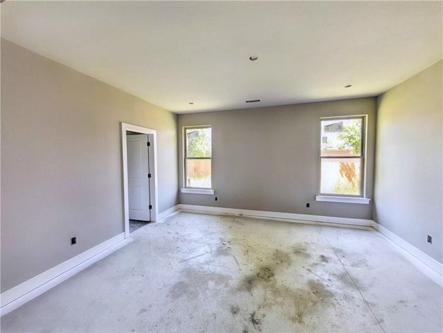 10 Olmsted Cir, Bella Vista, AR 72715 - unfurnished room with concrete floors and baseboards