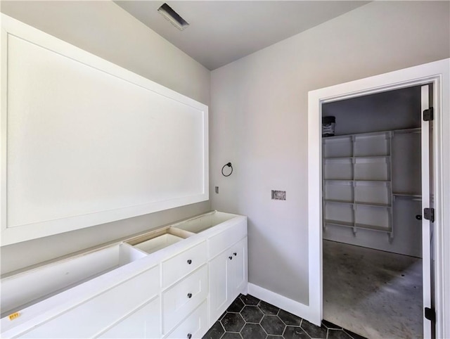 10 Olmsted Cir, Bella Vista, AR 72715 - bathroom featuring baseboards