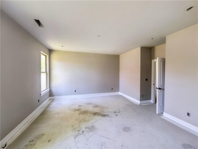 10 Olmsted Cir, Bella Vista, AR 72715 - spare room with unfinished concrete floors and baseboards