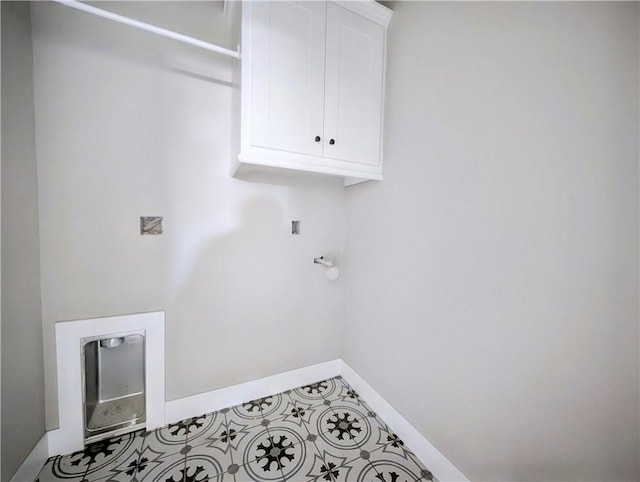 10 Olmsted Cir, Bella Vista, AR 72715 - washroom featuring cabinet space, baseboards, and washer hookup