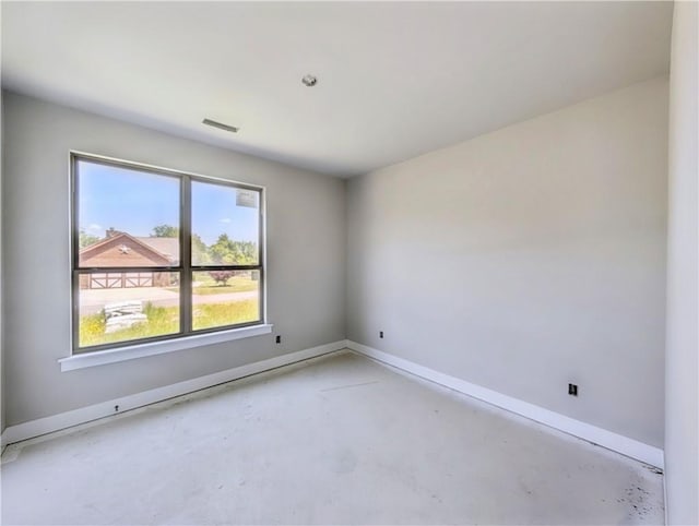 10 Olmsted Cir, Bella Vista, AR 72715 - spare room featuring unfinished concrete floors and baseboards