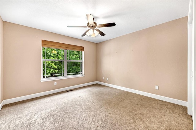 21 Sidlaw Hills Dr, Bella Vista, AR 72715 - carpeted empty room featuring baseboards and a ceiling fan