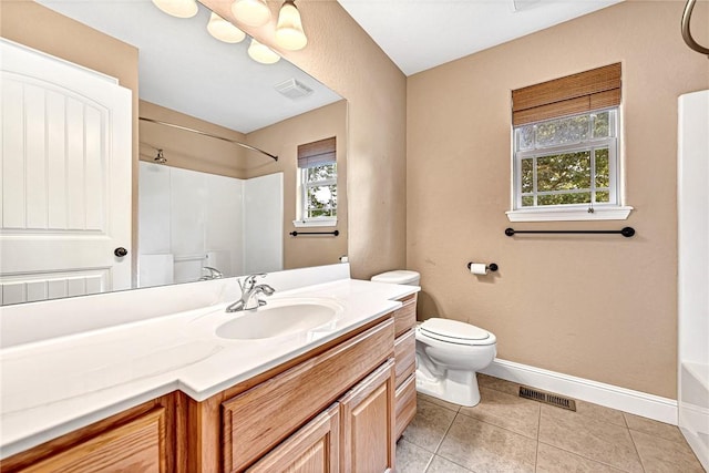 21 Sidlaw Hills Dr, Bella Vista, AR 72715 - full bathroom with a shower, toilet, baseboards, vanity, and tile patterned flooring