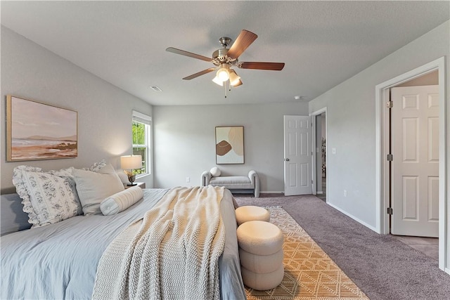 bedroom featuring carpet flooring, a ceiling fan, and baseboards