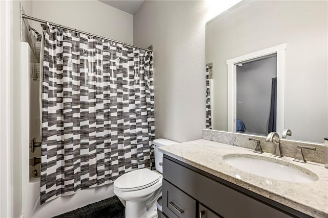 full bathroom with toilet, vanity, and shower / bathtub combination with curtain