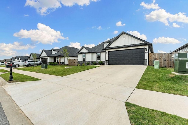 ranch-style house featuring driveway, an attached garage, stone siding, a residential view, and board and batten siding