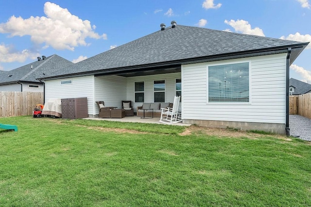 rear view of property featuring an outdoor hangout area, roof with shingles, and a patio