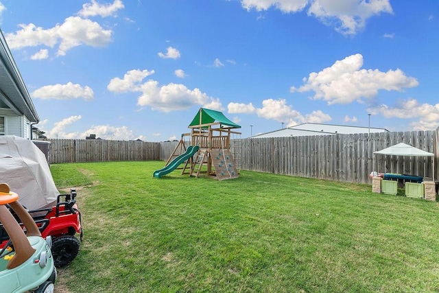 view of yard with a playground