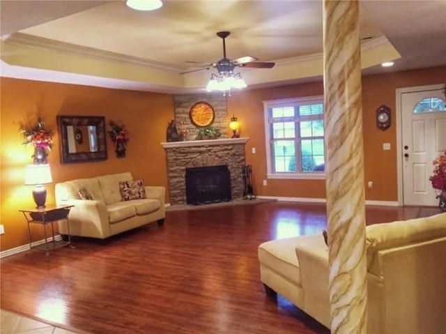 3801 SW Moline Ave, Bentonville, AR 72712 - living area with ornamental molding, ceiling fan, wood finished floors, and baseboards