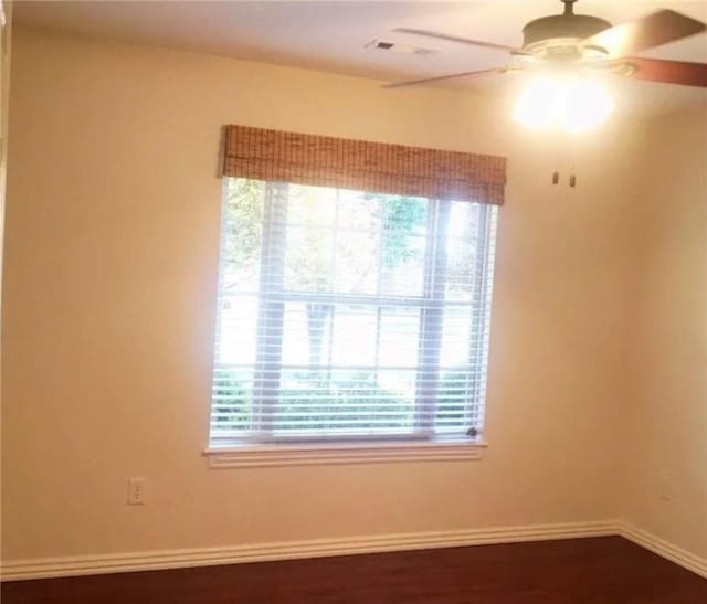 3801 SW Moline Ave, Bentonville, AR 72712 - spare room with ceiling fan and baseboards