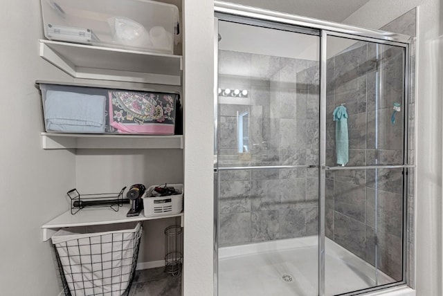 full bathroom featuring a shower stall