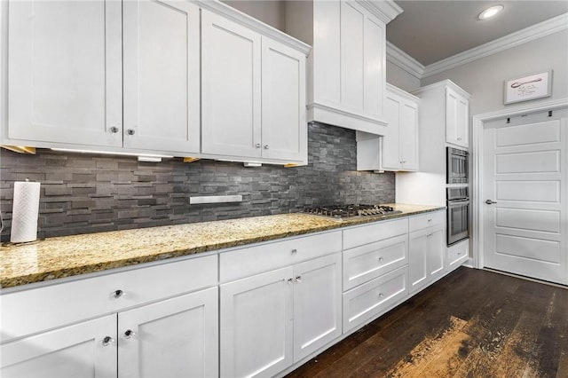 1438 Allens Mill Way, Cave Springs, AR 72718 - kitchen with appliances with stainless steel finishes, ornamental molding, white cabinets, dark wood-style flooring, and backsplash