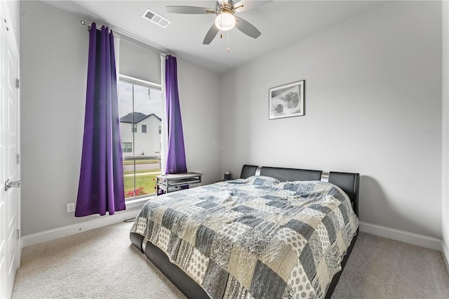 bedroom featuring carpet flooring, baseboards, and ceiling fan