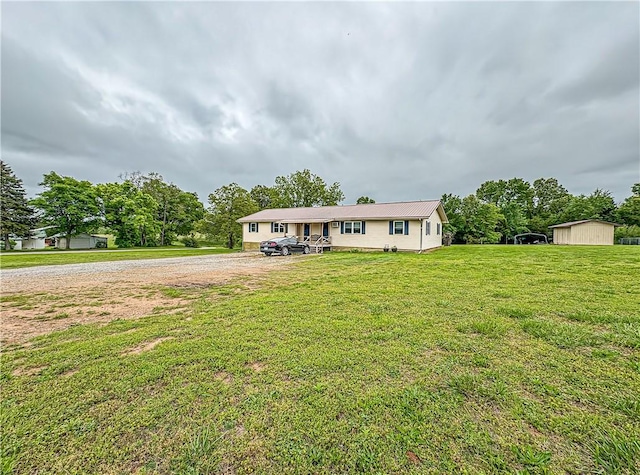 239 Mc 7043, Flippin, AR 72634 - ranch-style house with a front yard and driveway