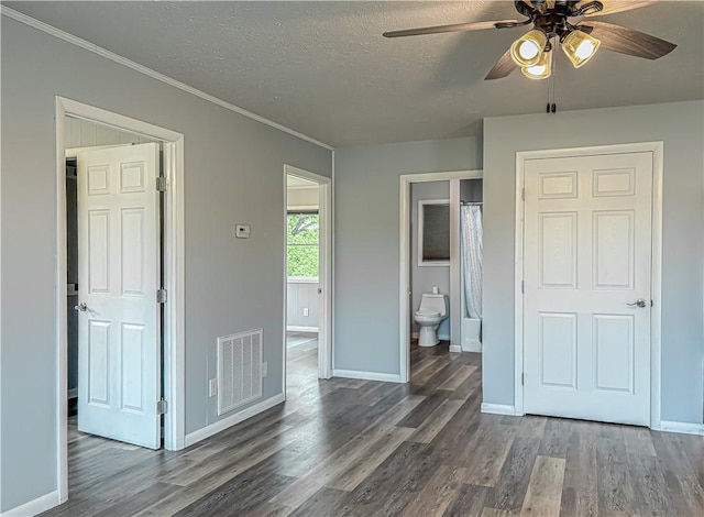 239 Mc 7043, Flippin, AR 72634 - unfurnished bedroom with baseboards, wood finished floors, crown molding, a textured ceiling, and connected bathroom
