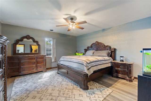1207 SE E St, Bentonville, AR 72712 - bedroom featuring light wood-type flooring, baseboards, and ceiling fan