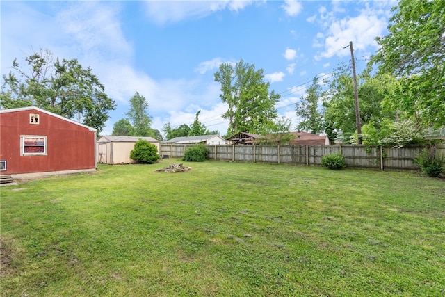 1207 SE E St, Bentonville, AR 72712 - view of yard featuring an outdoor structure and a storage shed
