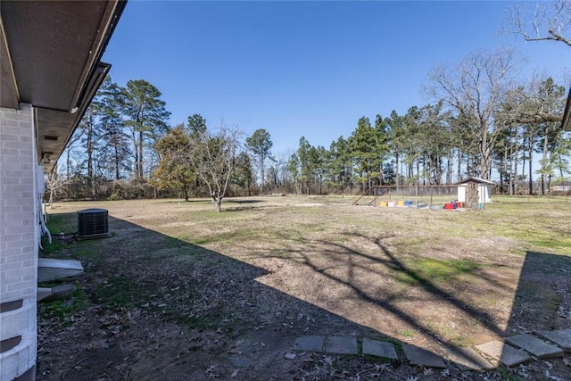2193 Nevada 18 Rd, Prescott, AR 71857 - view of yard with a storage unit, an outbuilding, and central AC unit
