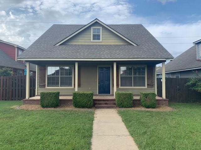 3804 Gibson Ave, Bentonville, AR 72712 - bungalow-style home featuring a shingled roof and a porch