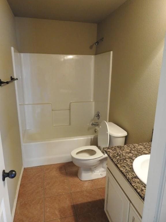 3804 Gibson Ave, Bentonville, AR 72712 - full bath featuring toilet, vanity, tile patterned flooring, and shower / tub combination