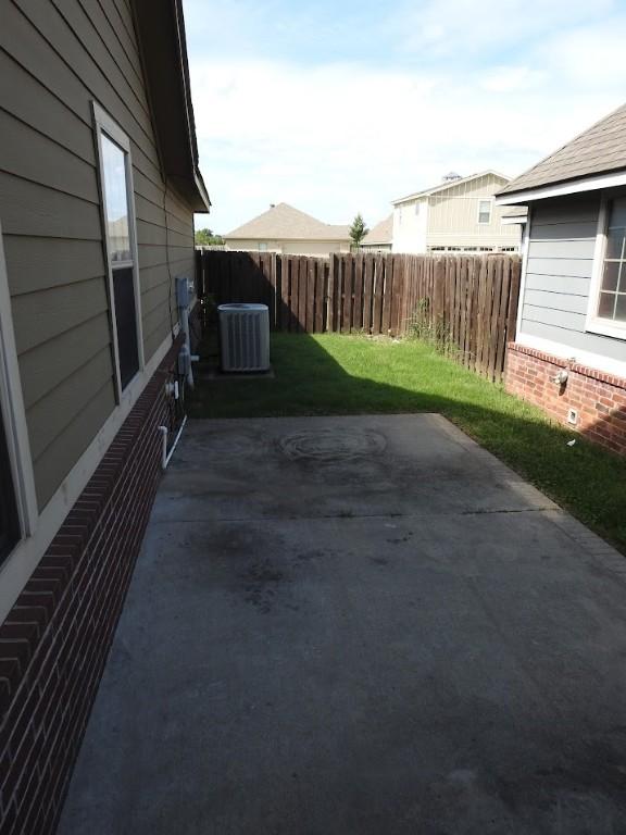 3804 Gibson Ave, Bentonville, AR 72712 - view of patio / terrace with central AC unit