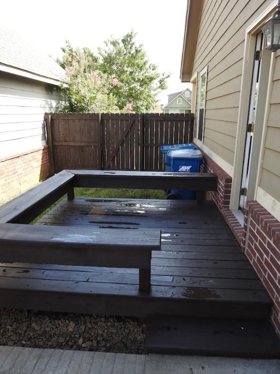 3804 Gibson Ave, Bentonville, AR 72712 - wooden terrace featuring fence