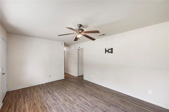 806 W 3rd St, Russellville, AR 72801 - empty room with ceiling fan, wood finished floors, and baseboards